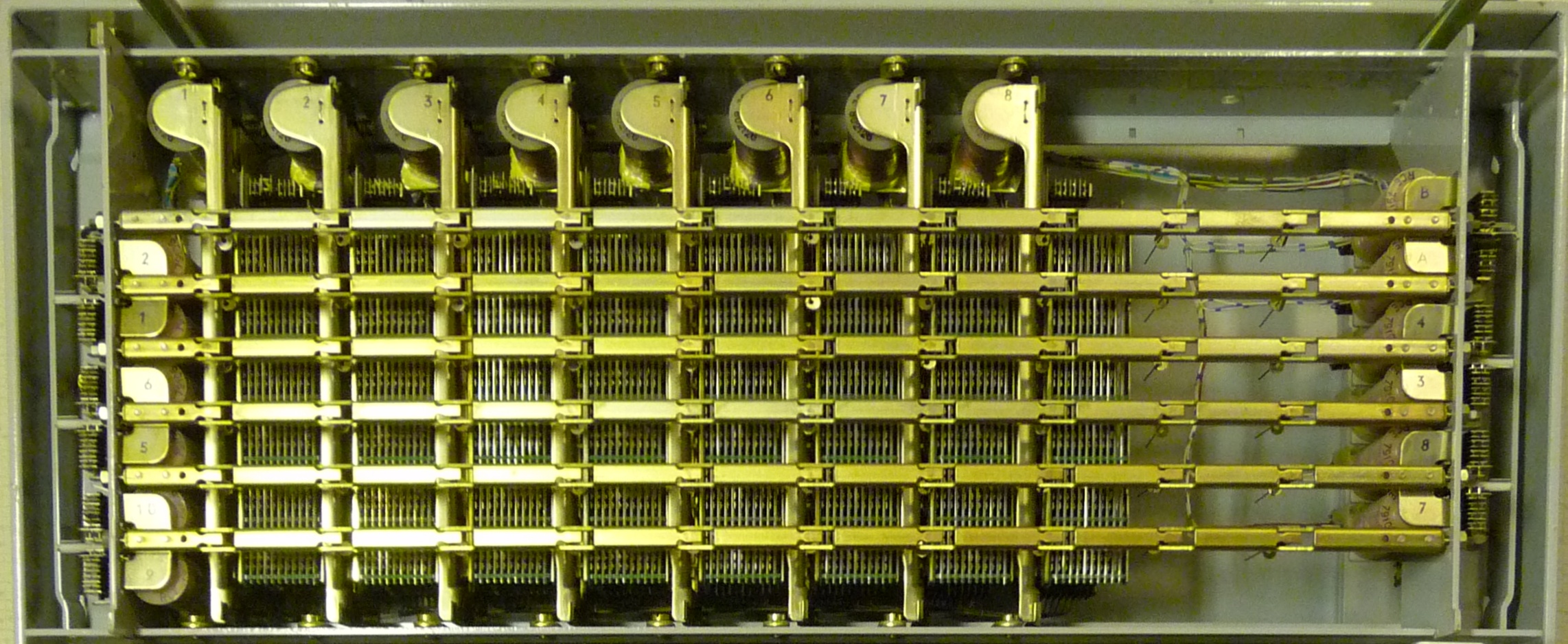 Figure 5 — An Ericsson crossbar switch (koordinatväljare), the European counterpart of the Western Electric switch: horizontal selecting bars with their magnets, and the vertical holding bars. Either make wou…